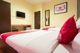 Thyesza Hotel by OYO Rooms