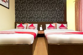 Thyesza Hotel by OYO Rooms