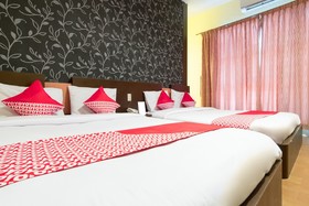 Thyesza Hotel by OYO Rooms