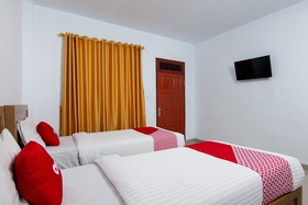 Thyesza Hotel by OYO Rooms