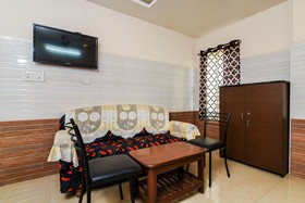 Varsha Grand Residence by OYO Rooms