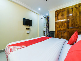 Sri Jaya Guesthouse By OYO Rooms