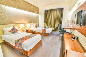 Sage Hotel by FabHotel