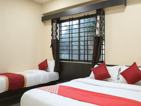 Champion Orchid By OYO Rooms