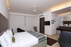 Oasis Hotel  by OYO Rooms