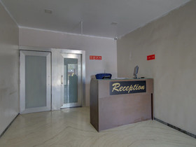 Log Inn Plaza By OYO Rooms