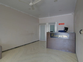 Log Inn Plaza By OYO Rooms