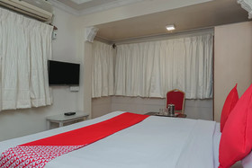 Tushar Hotels by OYO Rooms