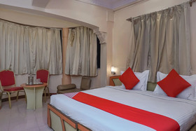 Tushar Hotels by OYO Rooms