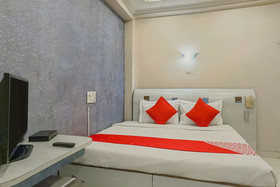 Tushar Hotels by OYO Rooms