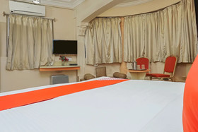 Tushar Hotels by OYO Rooms