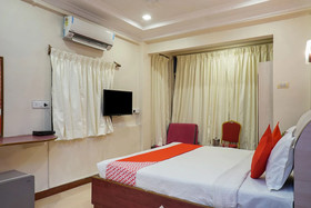 Tushar Hotels by OYO Rooms