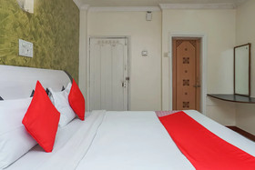 Tushar Hotels by OYO Rooms