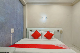 Tushar Hotels by OYO Rooms