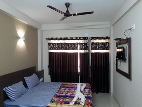 Hotel UK Palace Puri by Goroomgo