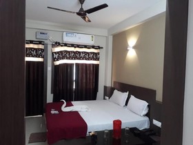 Hotel UK Palace Puri by Goroomgo