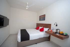 Capital O 18266 Hotel Arunaa Inn