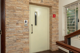 Cute Orange Service Apartments By OYO Rooms
