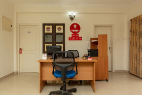 Cute Orange Service Apartments By OYO Rooms