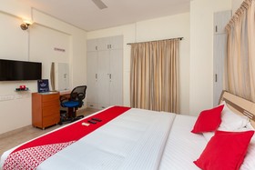 Cute Orange Service Apartments By OYO Rooms