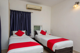 Cute Orange Service Apartments By OYO Rooms