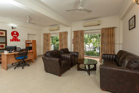 Cute Orange Service Apartments By OYO Rooms