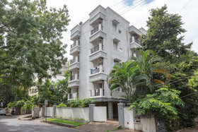 Cute Orange Service Apartments By OYO Rooms