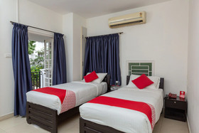 Cute Orange Service Apartments By OYO Rooms
