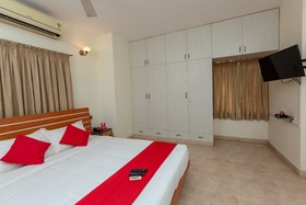 Cute Orange Service Apartments By OYO Rooms