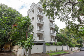 Cute Orange Service Apartments By OYO Rooms