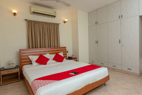Cute Orange Service Apartments By OYO Rooms