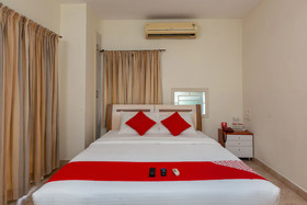 Cute Orange Service Apartments By OYO Rooms