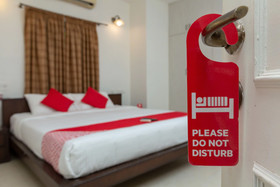 Cute Orange Service Apartments By OYO Rooms