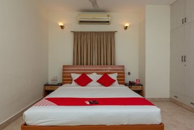 Cute Orange Service Apartments By OYO Rooms