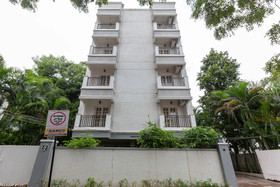 Cute Orange Service Apartments By OYO Rooms
