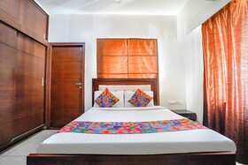 Home Tree Service Apartment by FabHotel