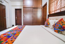 Home Tree Service Apartment by FabHotel