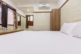 New Victory Mansion & Lodging by OYO Rooms