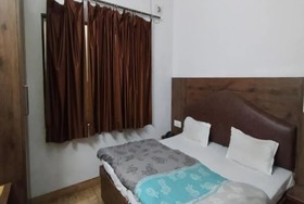 Goroomgo Supreme Guest House Dehradun