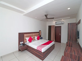 Woods Inn By OYO Rooms
