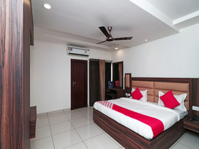 Woods Inn By OYO Rooms