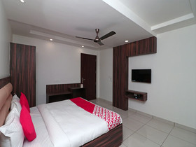 Woods Inn By OYO Rooms