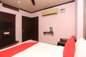 Palm Tree by OYO Rooms