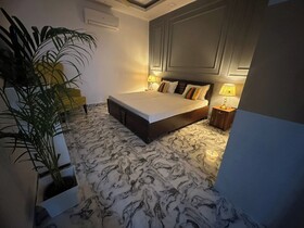 Goroomgo Omasha Residency Noida