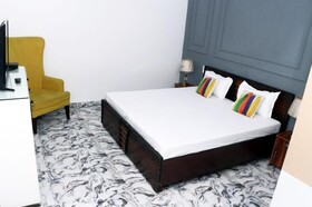 Goroomgo Omasha Residency Noida