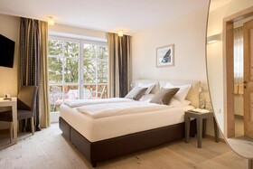 Dolomit Homes & Hotel