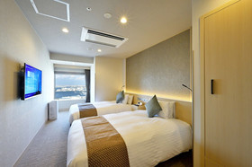 Odysis Suites Osaka Airport Hotel