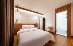 Osan Hotel Raum