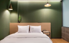 Osan Hotel Raum
