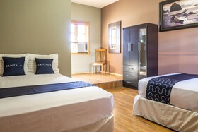 Capital O Hotel Villa Azura